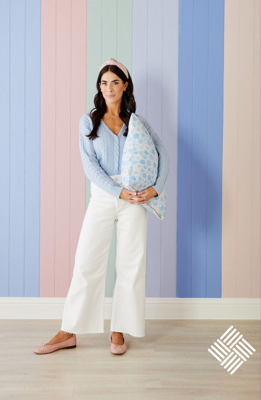 Sarah sitting on a couch